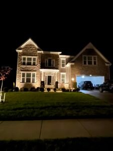 Technician repairing residential sprinkler irrigation system in Northern Virginia